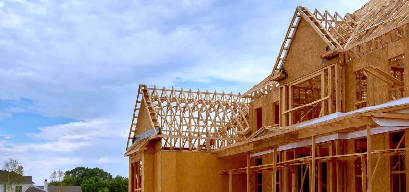 Bâtiment de construction en bois d’œuvre massif encapsulé : Nouvelle réglementation en vigueur